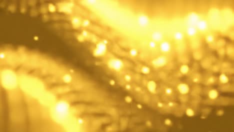 stunning visual effects create mesmerizing patterns of shimmering gold. dynamic movement evokes a sense of energy and flow, capturing the beauty of light and texture in a captivating display.