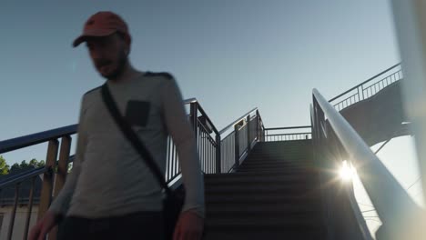 passenger takes to the railway station exit heading onto next destination