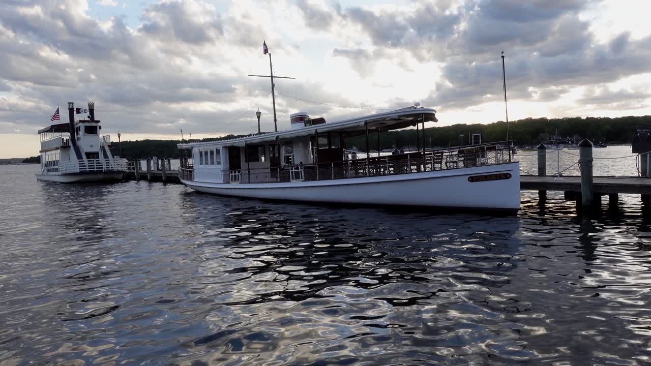 Beautiful yacht docked on a pier in the evening