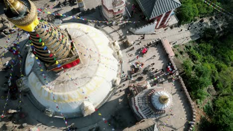 aerial view over swayambhunath temple pagoda roof, ancient buddhist monastery, with prayer flags, kathmandu, nepal