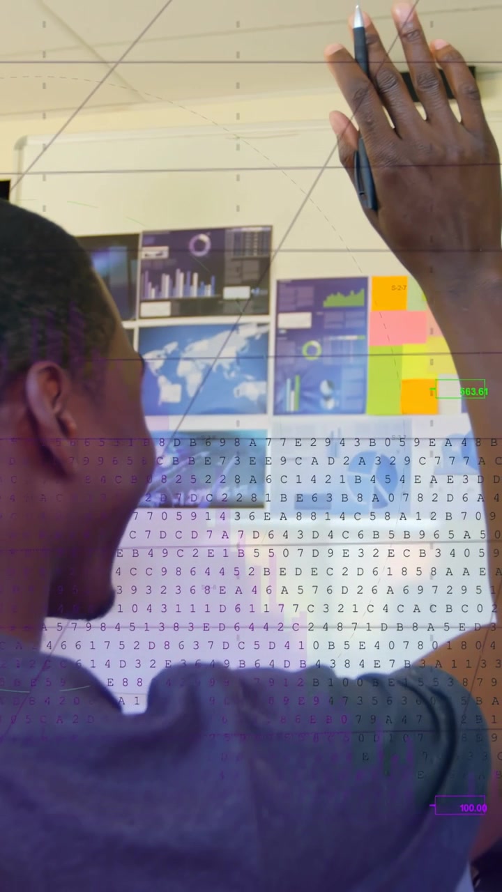 Vertical video: Man tapping display with stylus, raising arm and aligning graphs for business