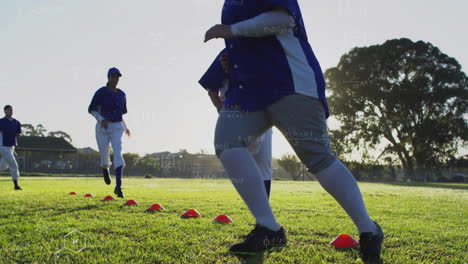 Team running footwork drills with cones at sunset for sports training, overlaying data graphs