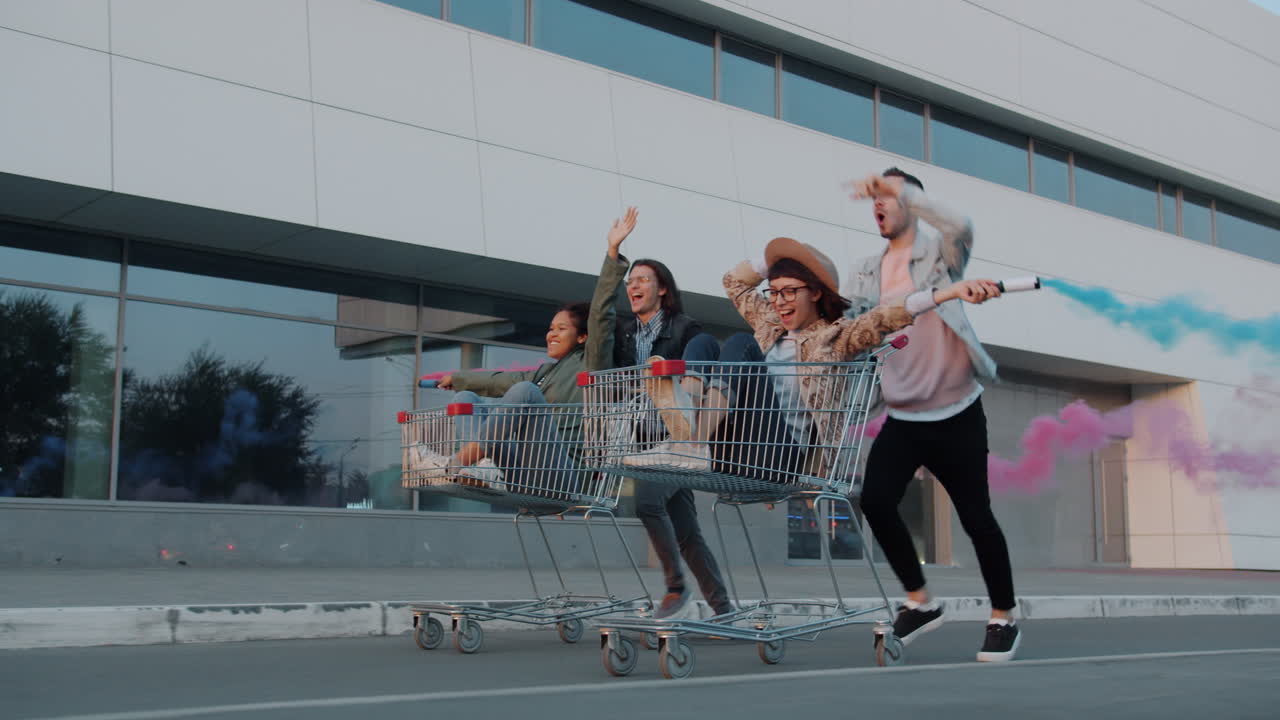 Friends having fun with shopping carts
