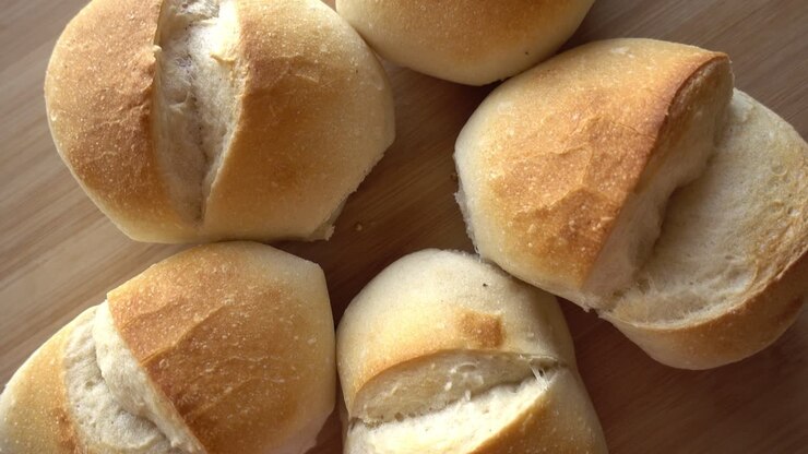 Bread on Wooden Background Rotates