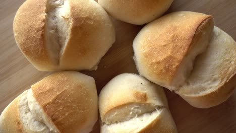 bread on wooden background rotates