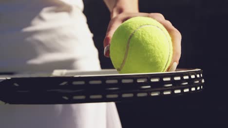 Woman-playing-tennis-on-a-sunny-day