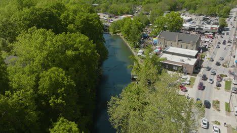 Aerial-View-Of-Sager-Creek-During-Dogwood-Festival-In-Downtown-Siloam-Springs,-Arkansas