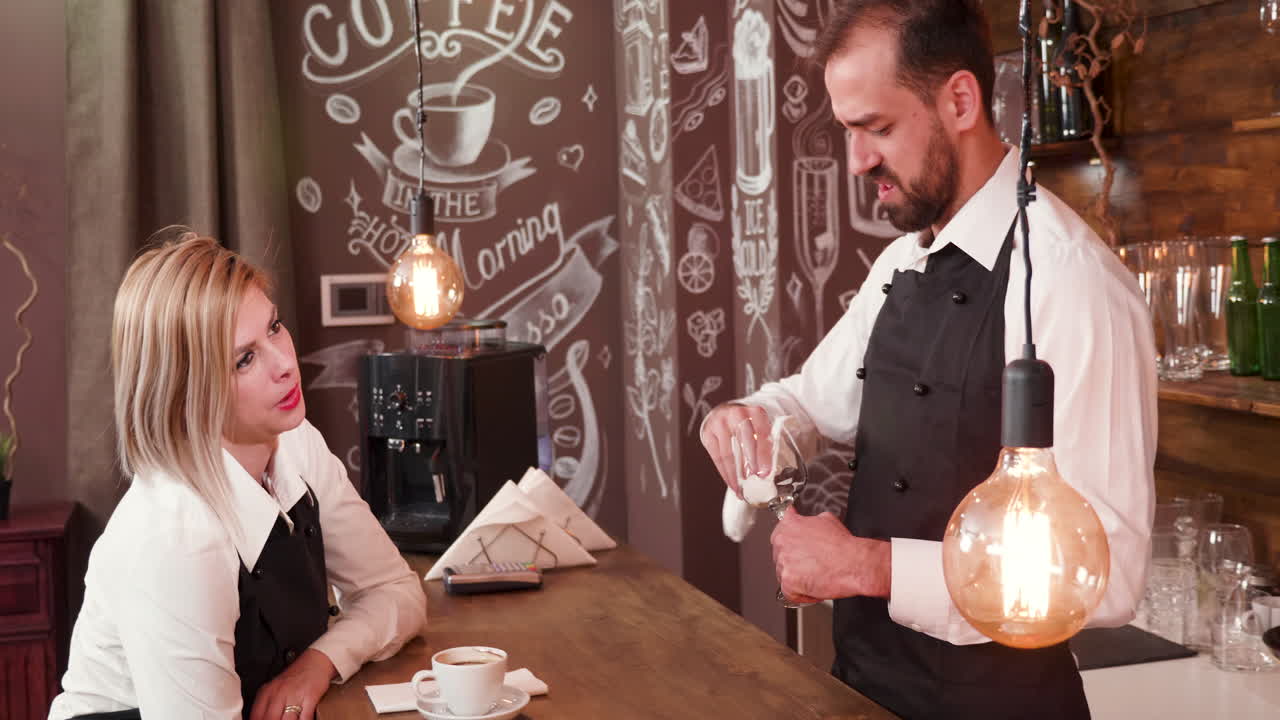 Cafe scene with waitress and bartender