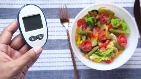 blood sugar monitoring and healthy salad