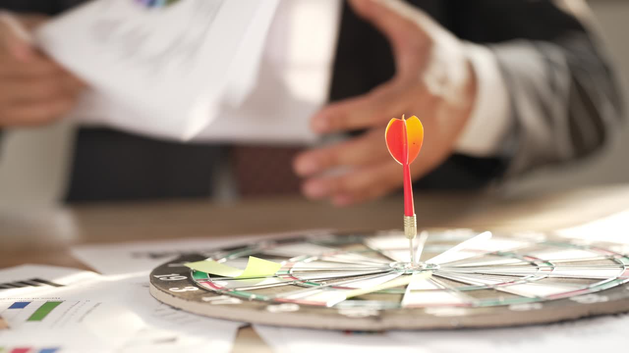 Business people manage documents on the desk at the office