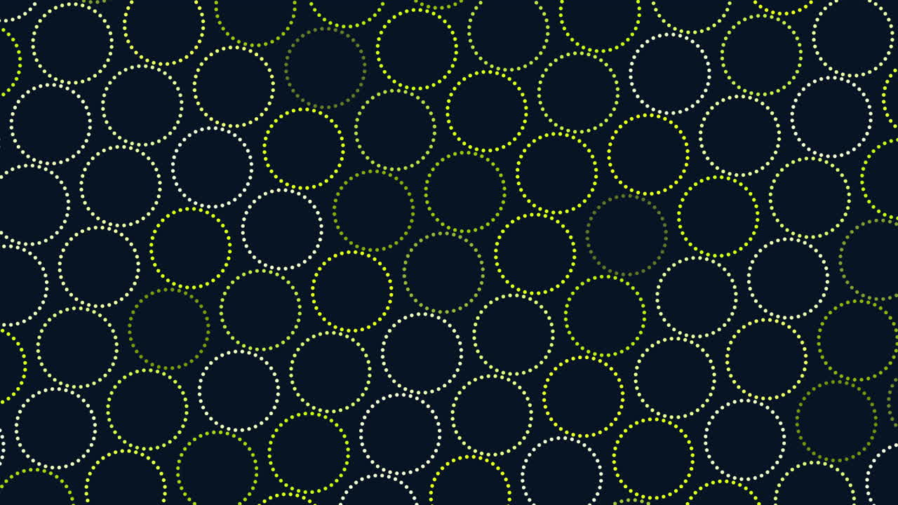 A unique pattern of floating circles composed of small dots on a black background. A green line cuts through the circles, creating an intriguing visual contrast