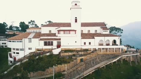 Drone-side-view-of-the-mountain-of-Monserrate-in-Bogotá,-Colombia