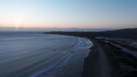 Dramatic-drone-shot-flyover-of-Stinson-beach,-California-at-dusk