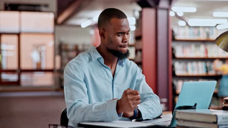 man studying in a library