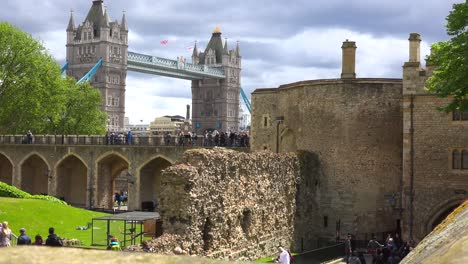 the tower bridge in london england is seen from the perspective of the tower of london