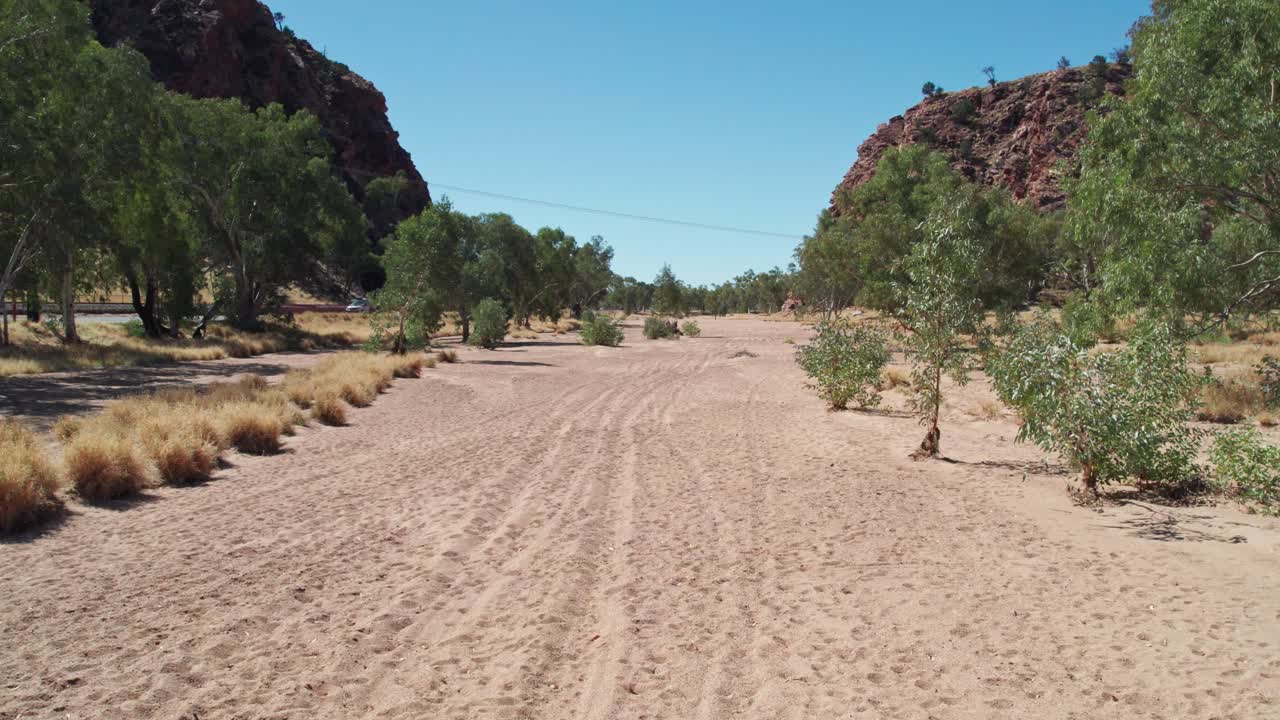 Reversing footage past the stream gauge on the Todd River at Heavitree Gap (station G0060126), Alice Springs, Mparntwe. Northern Territory, Australia. August 2022
