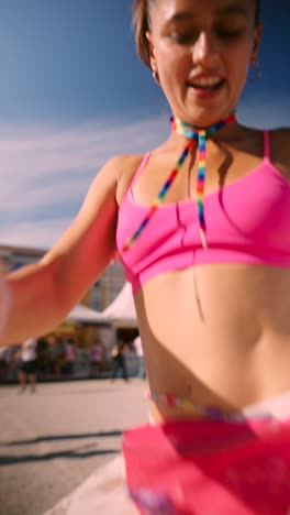 woman dancing at a pride festival
