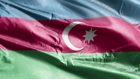 bandera textil de azerbaiyán agitando lentamente en el bucle del viento. bandera azerbaijana balanceándose suavemente en la brisa. tejido textil de tela. fondo de relleno completo. bucle de 20 segundos.