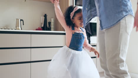 parent, dancing and little girl twirling