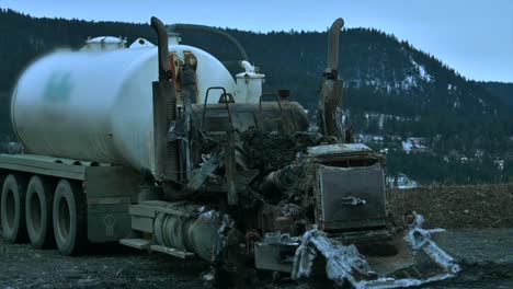 a closer look at a fuel truck destroyed by fire: a zoomed-in view