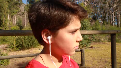 boy listening music in boot camp