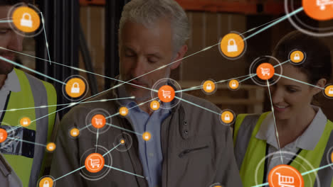 animation of network of connections with icons over diverse business people working in warehouse