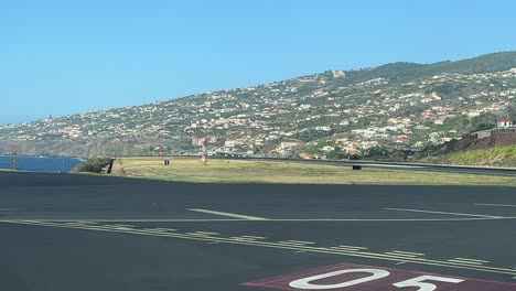 medium size turboprop airplane landing in heavy wind conditions