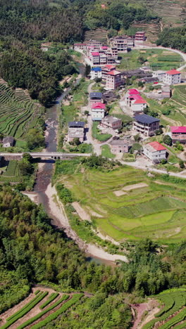 mountain village with terraced fields and tea plantations
