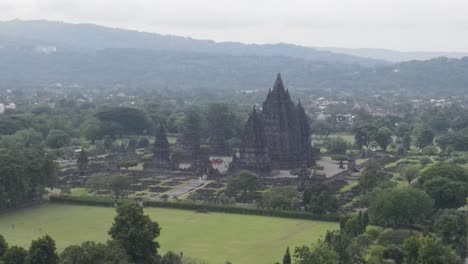aerial view of the magnificent and mysteriously misty prambanan temple. a unesco world heritage site, the largest hindu temple in indonesia, and one of the most beautiful temples in southeast asia.