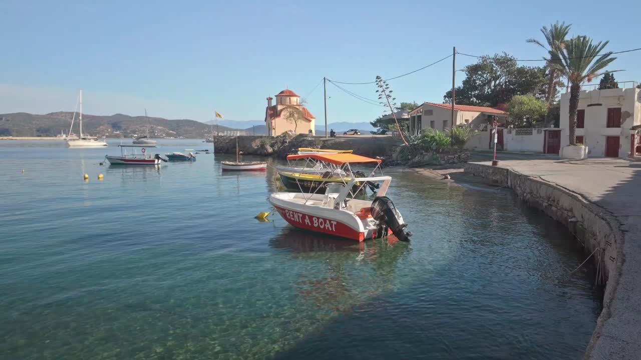 Scenic View of a Boat Rental in a Greek Island Harbor