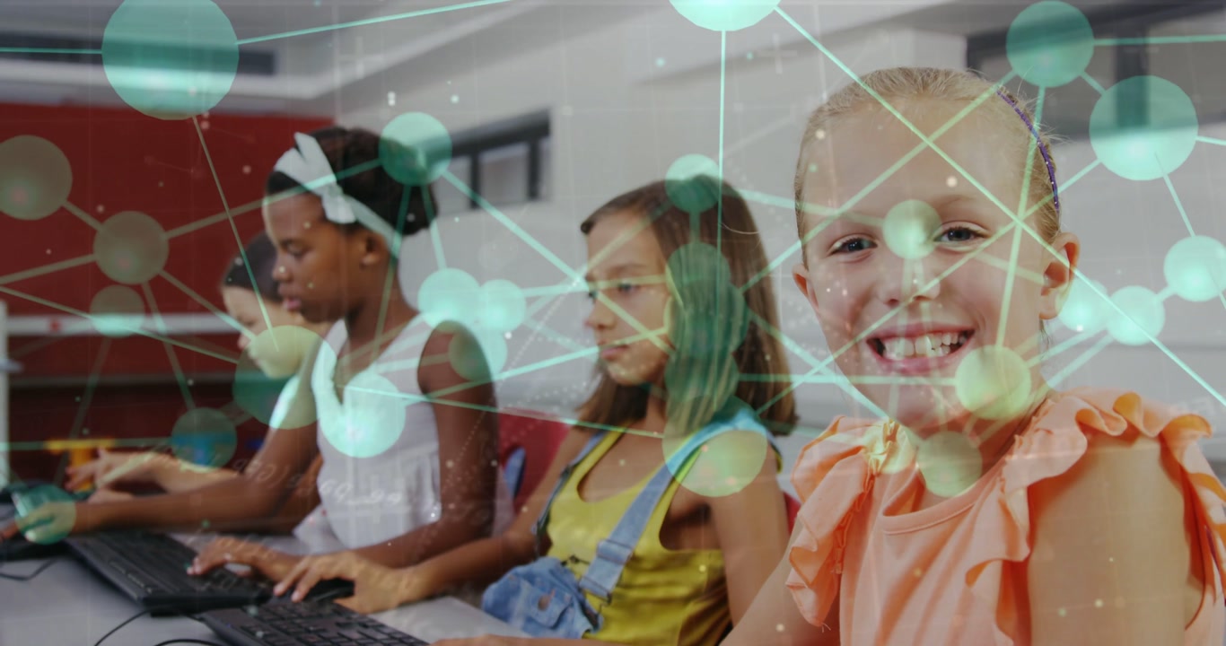Girl smiling at camera while peers typing, keyboards causing network overlay on education screens