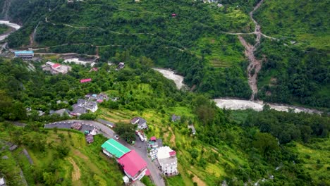 Towns-located-on-the-edge-of-Himalaya-mountain-range-in-India-fully-covered-with-greenery