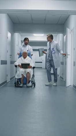 doctors guiding an elderly patient through a hospital corridor.