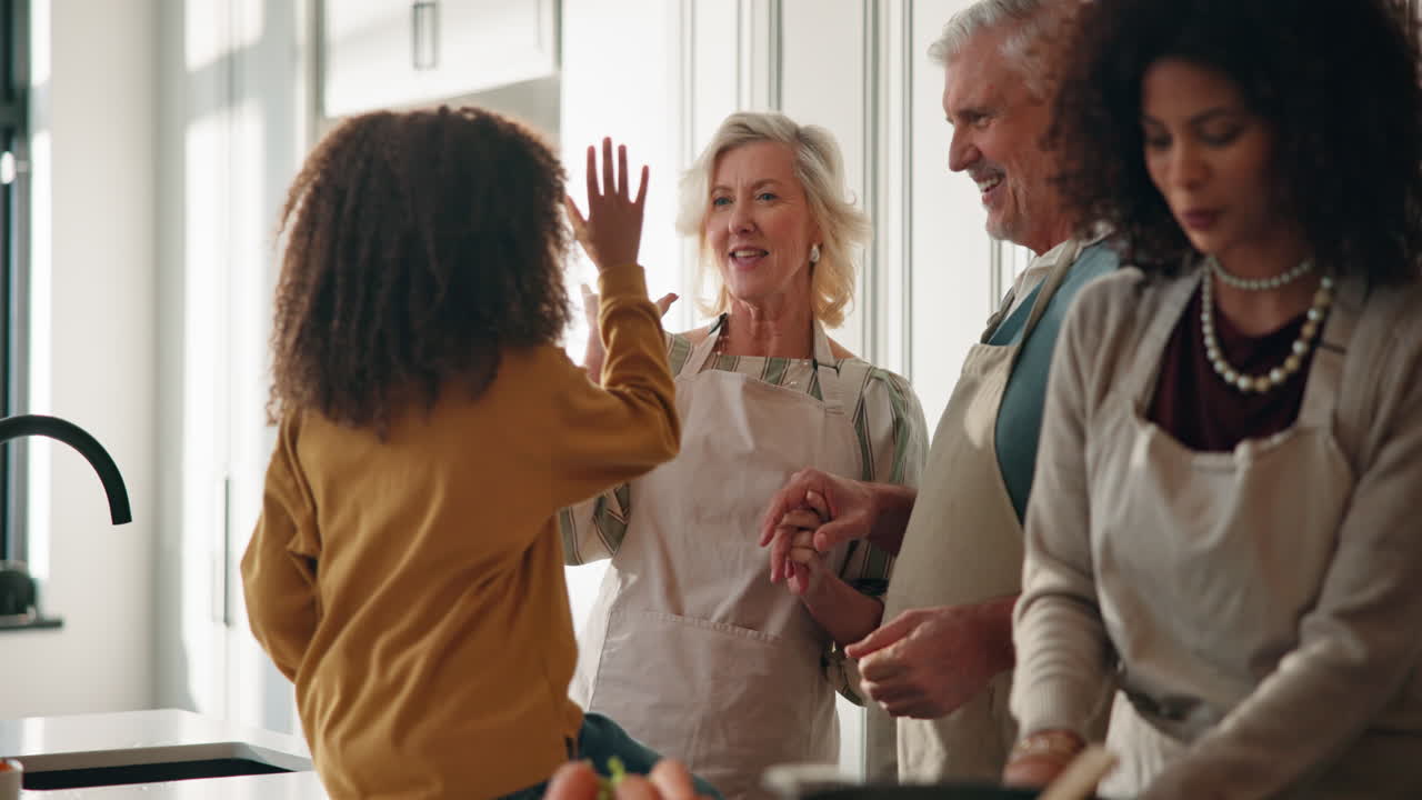 Family cooking together in the kitchen