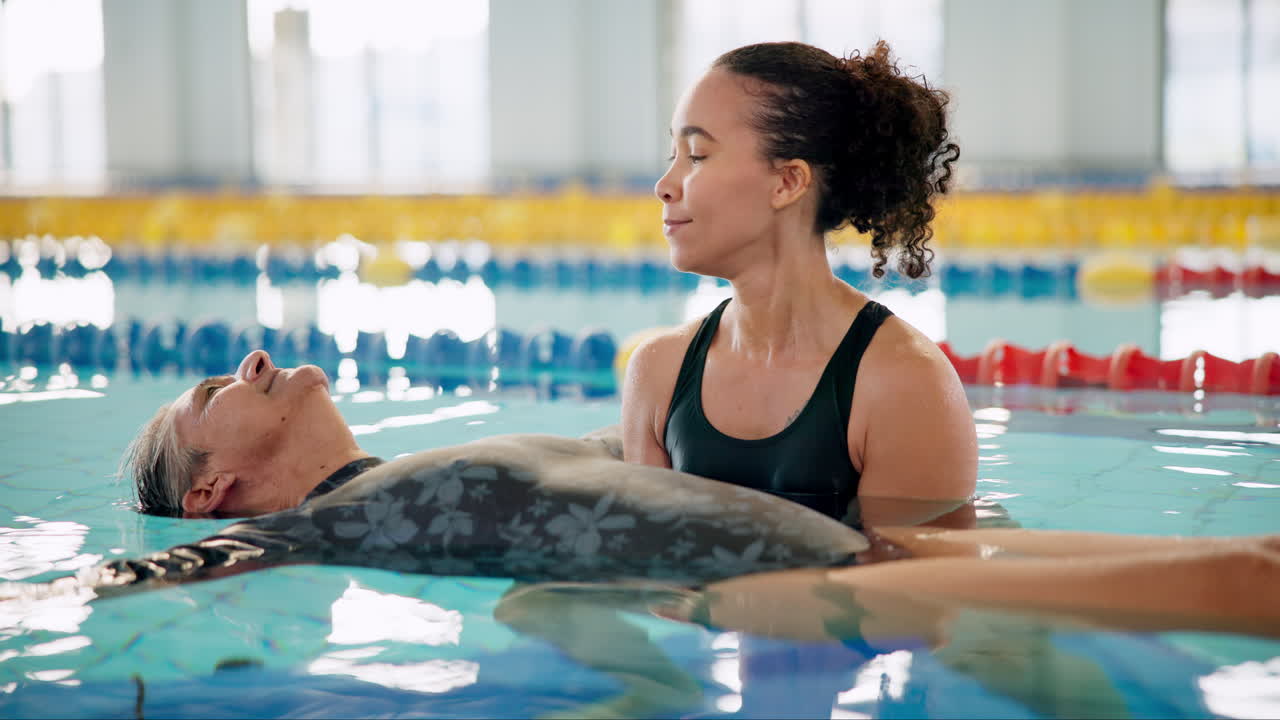 Aquatic therapy session with senior woman