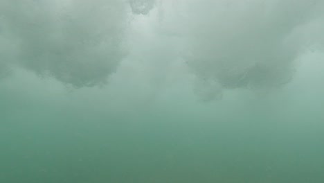 Underwater-Perspective-Below-Strong-Breaking-Surf-Waves