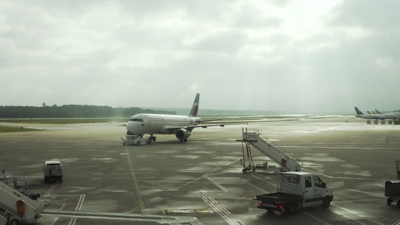 Modern Aircraft of Eurowings ready for departure on runway at Koeln Bonn Airport