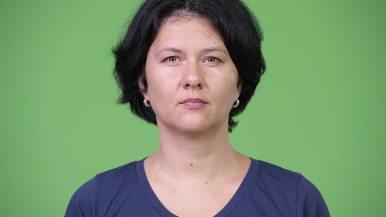 Beautiful woman covering ears as three wise monkeys concept