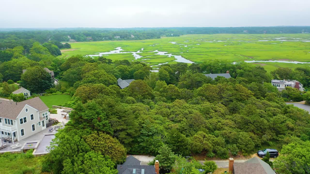 Aerial View of Marshland with Houses