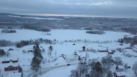 The-frozen-lake-and-forest-near-Borgvattnet,-Sweden