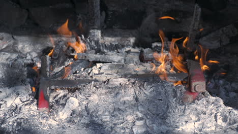 Fire-flame-in-empty-barbecue,-bbq-grill-at-slow-motion