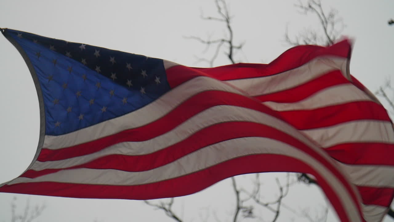 Close Up Of The American Flag Waving In The Wind