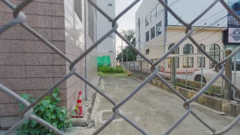 metal diamond shaped fence at mrt station in bangkok, thailand