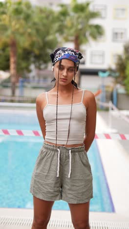 young woman by pool