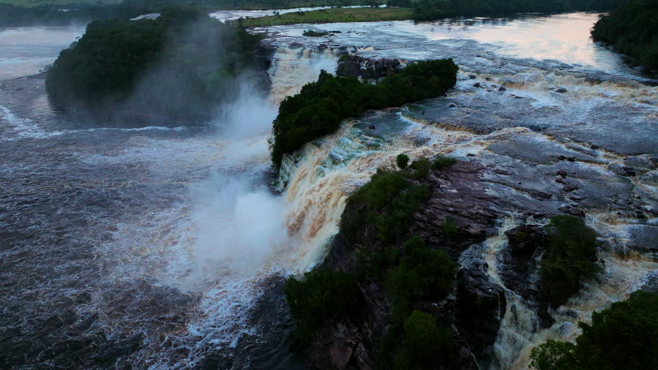 Aerial View of Stunning Waterfall in Lush Green Forest