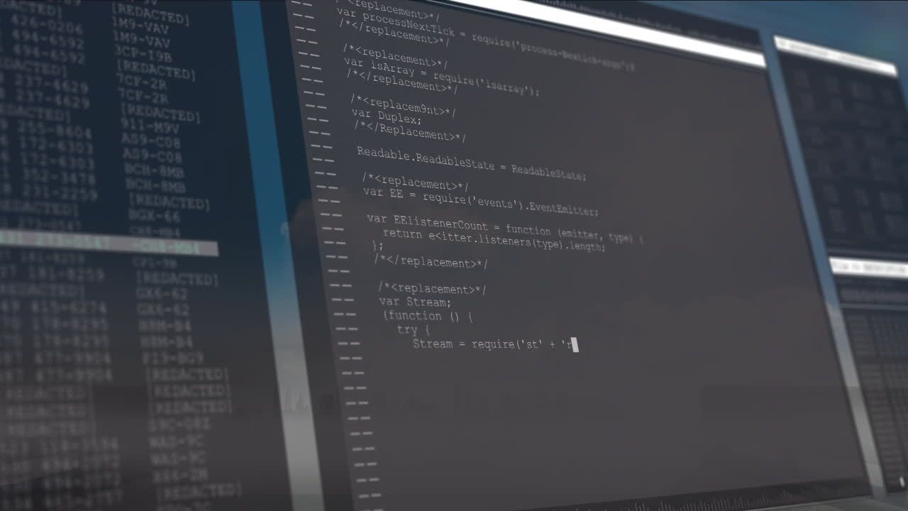 Displaying animation of code on computer screen with cityscape reflection