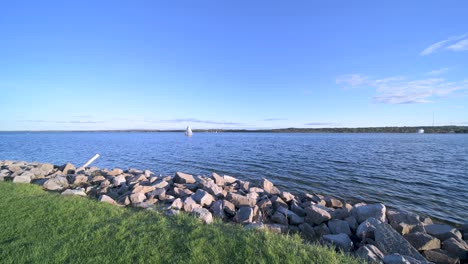 Sailboat by the beach Barrie Ontario right at sunset 4k