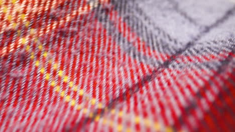 extreme close up over a plaid patterned flannel shirt