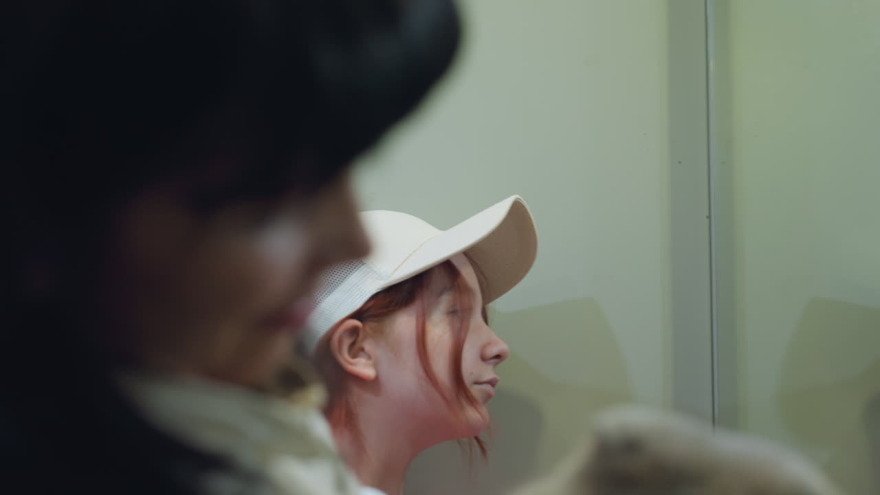 Mom And Kid Bonding, Comforting Glance Exchange Between Mother And Child Inside Elevator, An Endearing Connection Forms As Mother And Child Share Special Moments In Confined Elevator Space