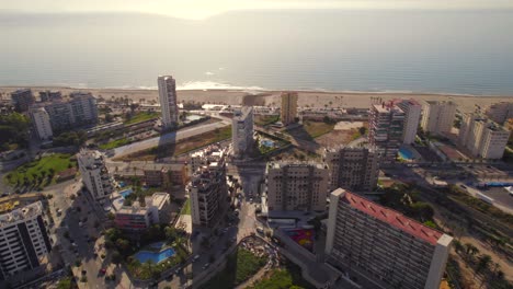 aerial establisher on sunny touristic coastal resorts in alicante at dawn